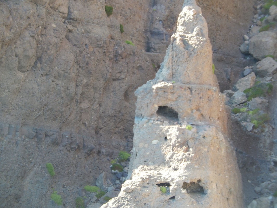 Hikers exploring a canyon arroyo in the mountains near Loreto