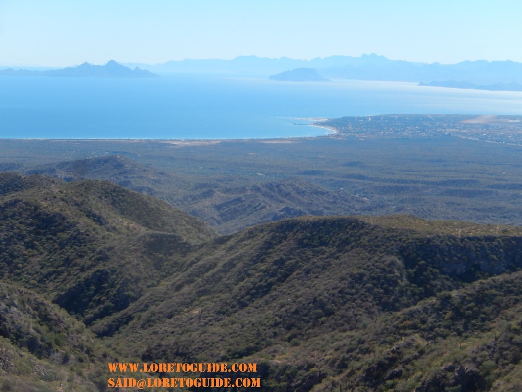 Hiker on a desert trail through the Sierra de la Giganta near Loreto