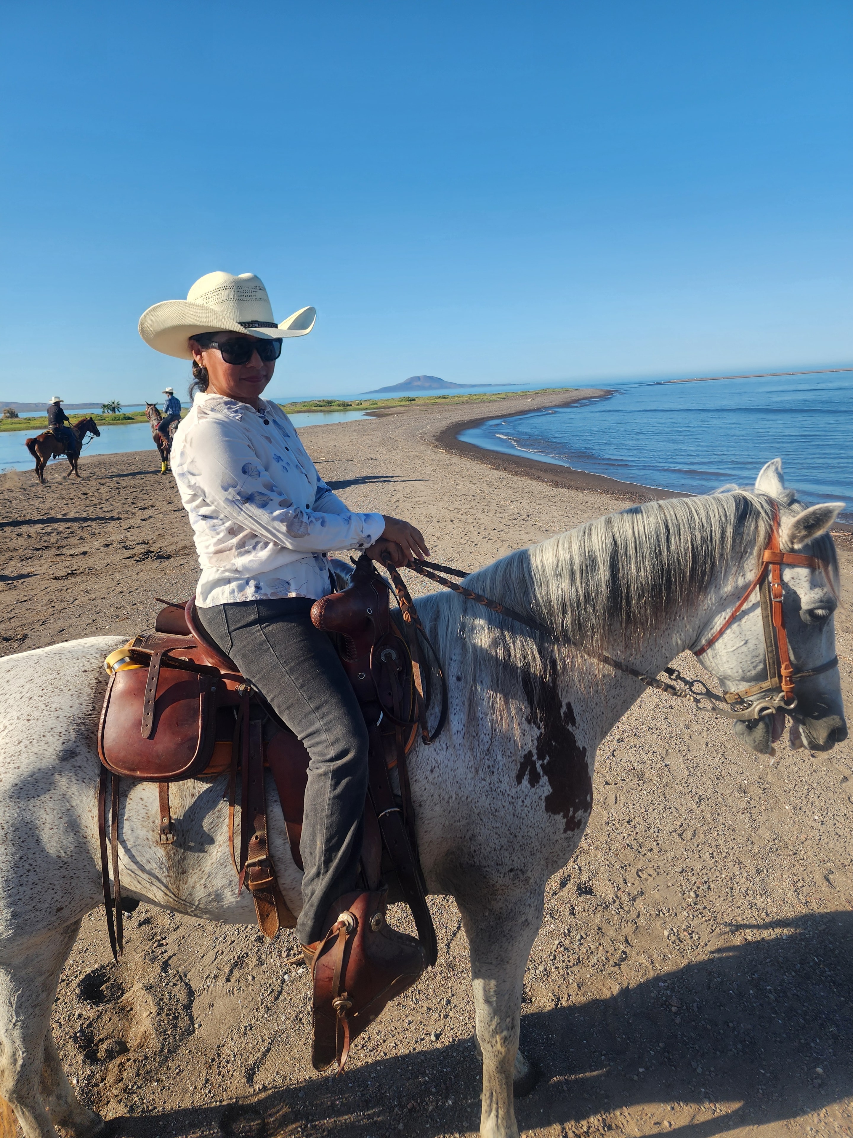 Horseback riders on a guided trail tour near Loreto, Baja California Sur