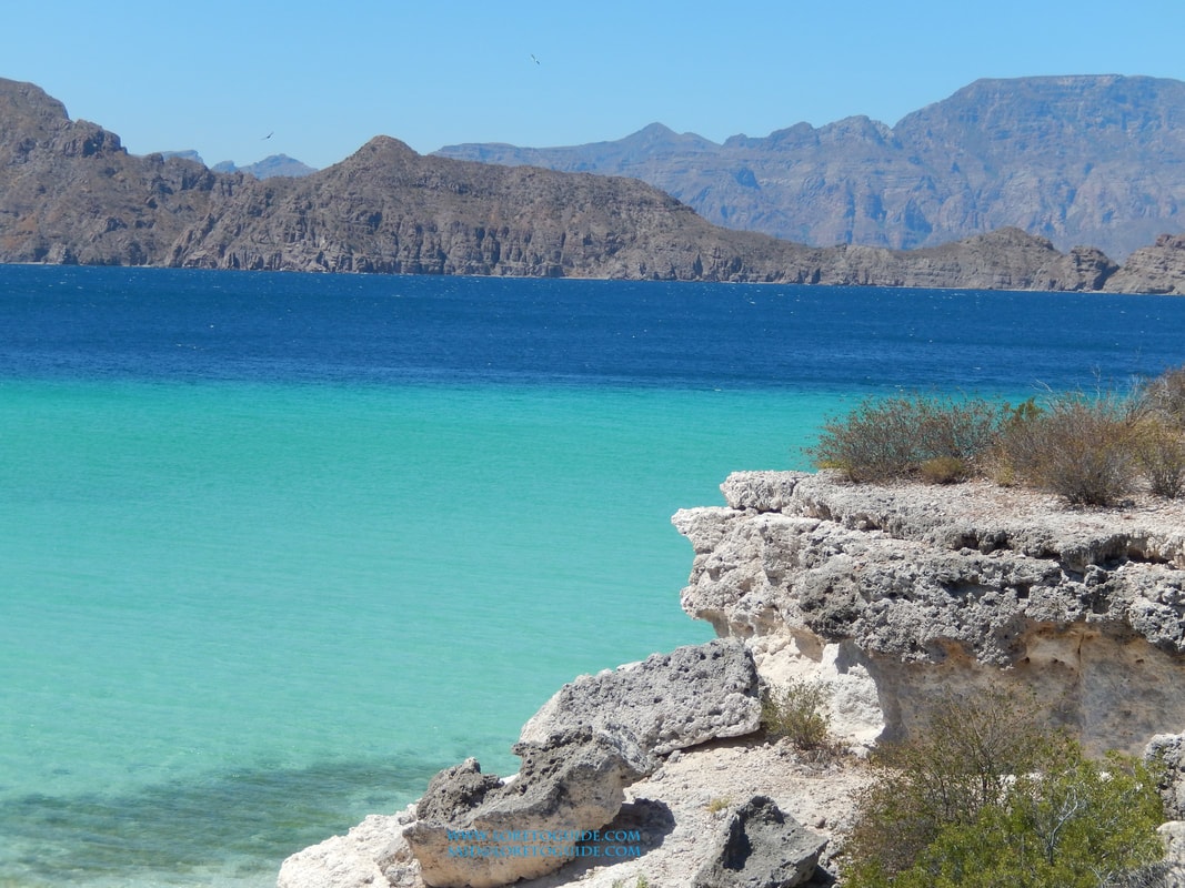 White sand beach on Isla del Carmen with turquoise Gulf of California waters